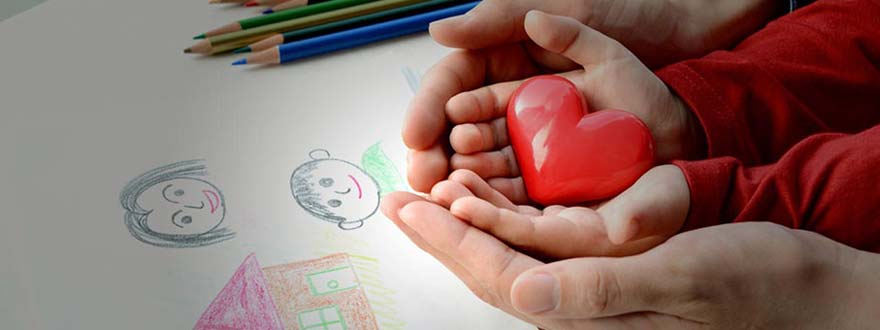 Toy heart in the hands of a child